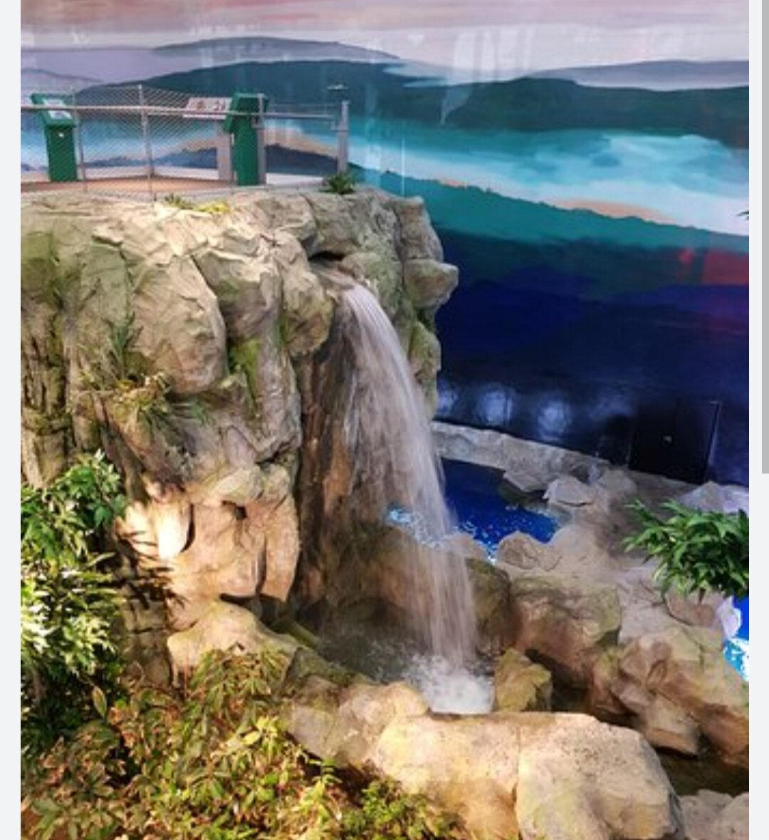 Artificial rock waterfall feeding a pool at the Sheikh Abdullah Al-Salem Cultural Centre, Kuwait